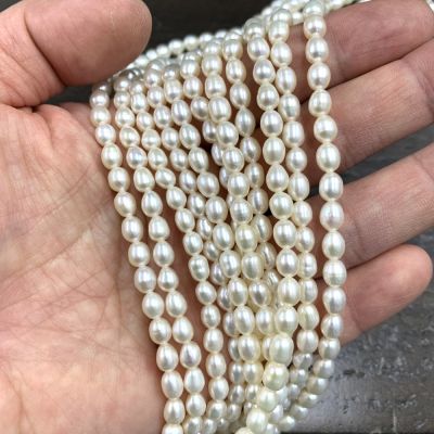 4-5mm Oval Freshwater Pearls, White (16" Strand)